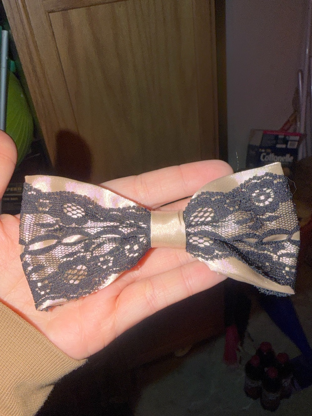 Black and gold tan lace bow